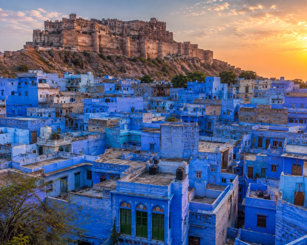 Mehrangarh Fort at sunset overlooking the blue-painted rooftops of Jodhpur's old city